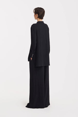 Set coordonat cu bluză ușoară texturată și pantaloni largi – negru