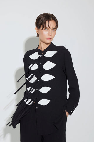 Set coordonat cu bluză ușoară texturată și pantaloni largi – negru