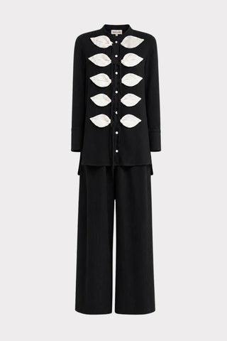 Set coordonat cu bluză ușoară texturată și pantaloni largi – negru
