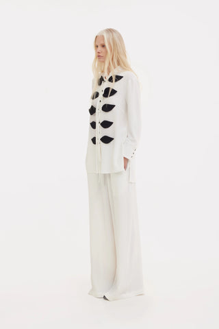 Set coordonat din bluză ușoară cu efect crinkled și pantaloni largi – ivory