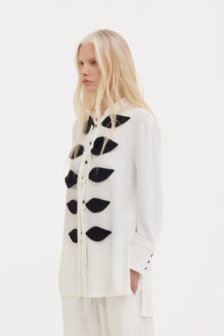 Set coordonat din bluză ușoară cu efect crinkled și pantaloni largi – ivory