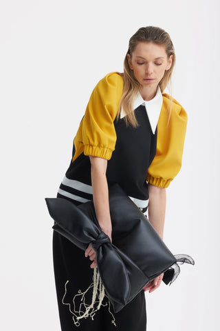 Клатч из искусственной кожи с объёмным бантом — чёрный